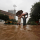 india-rains-delhi-kerry
